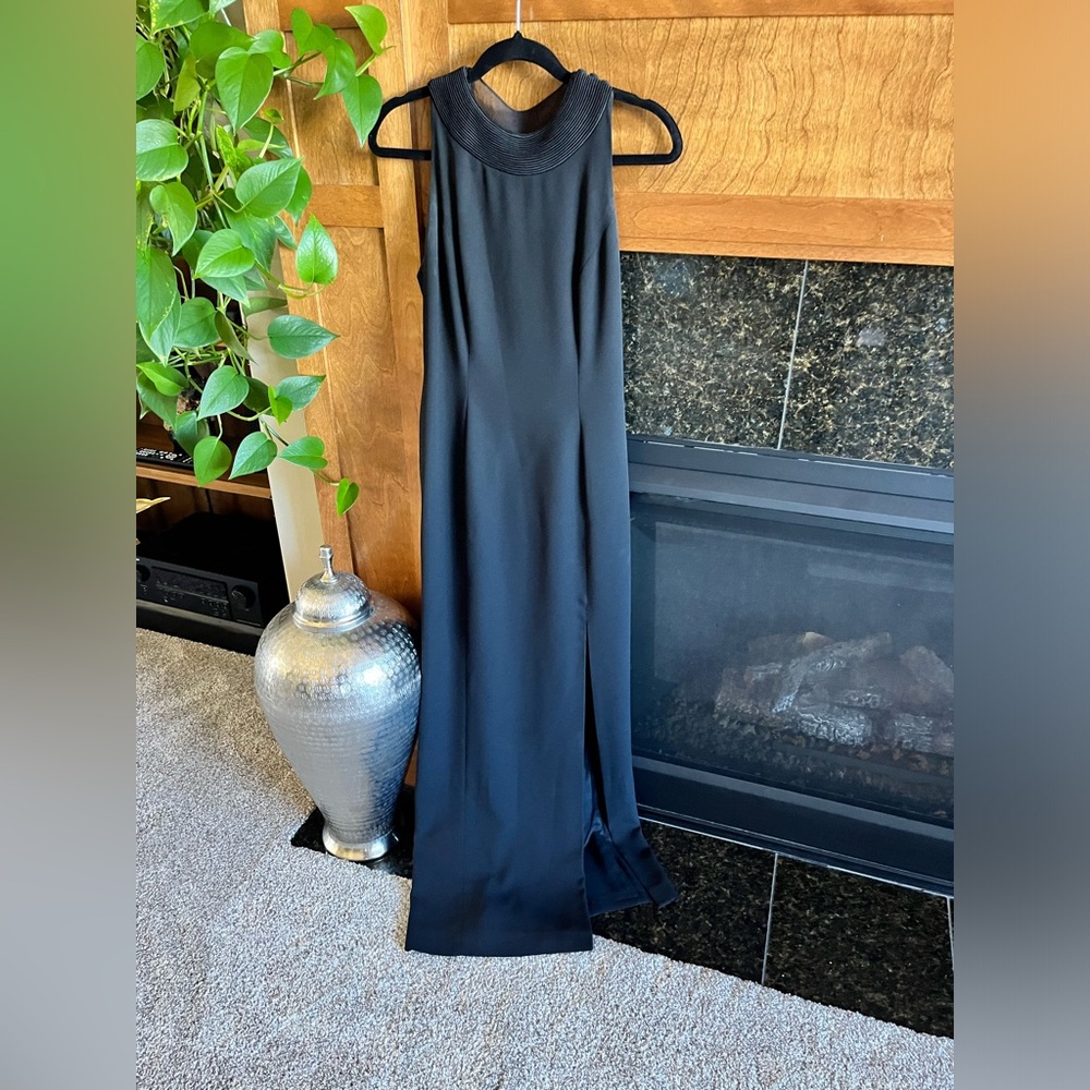 Women’s full length. Sleeveless black dress medium.
